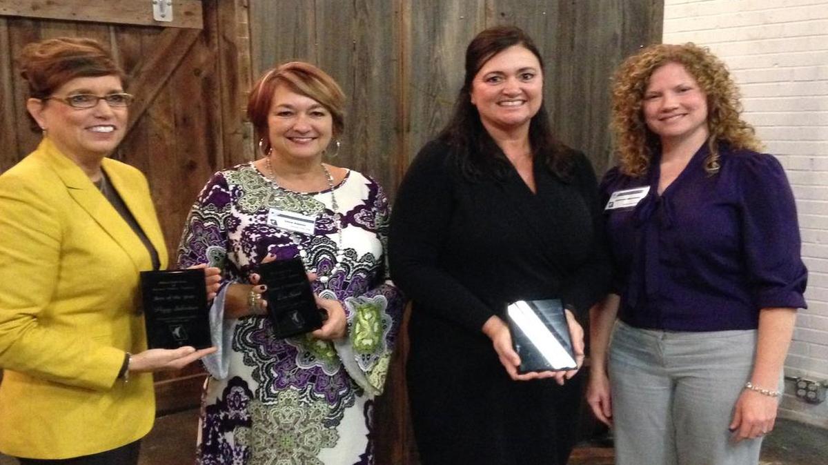 Award Winners: From left are Highland IFBW award winners Peggy Sebastian, Boss of the Year; Lisa Sauer, Woman of Achievement; and Maura Donnelly, Women Mean Business Award; along with Becky Obermark, Highland IFBW president.