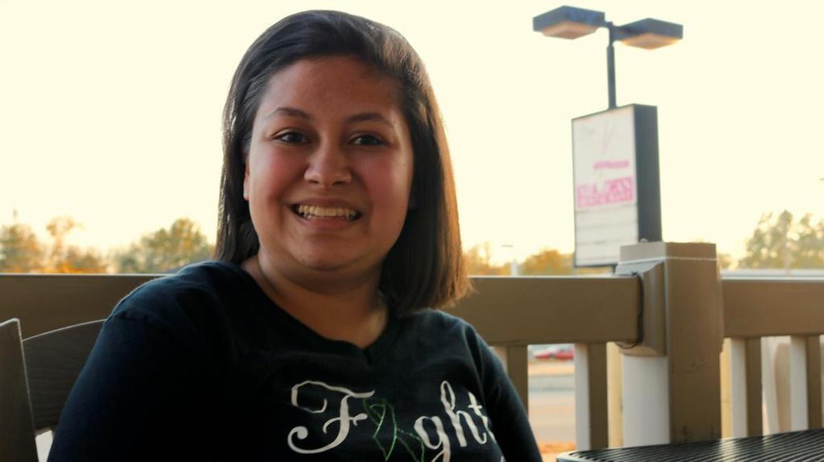 Ana Cantrell, 19, wearing her ‘Team Ana Fight Like a Girl’ t-shirt during a fundraiser event at Don Ole, located at 721 Broadway. On May 3, Ana was on her way home to get ready for work when her car was struck by a train at an unmarked crossing on Farmlane Road near Veterans Honor Parkway in Highland. For the past six months, Ana has been going through a rigorous regimen of therapy to recover from the accident.