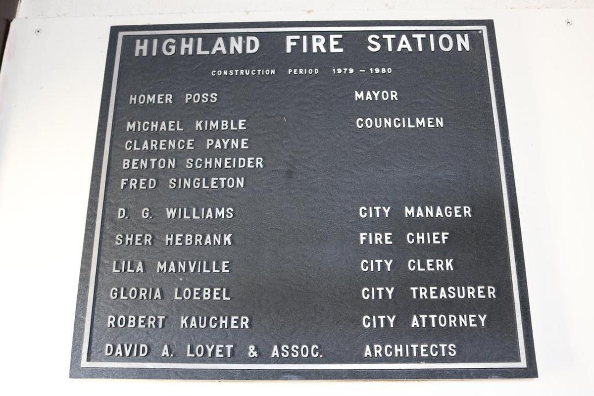A plaque at the 1115 Broadway fire and emergency medical service station in Highland. The plaque shows the year the building was built.