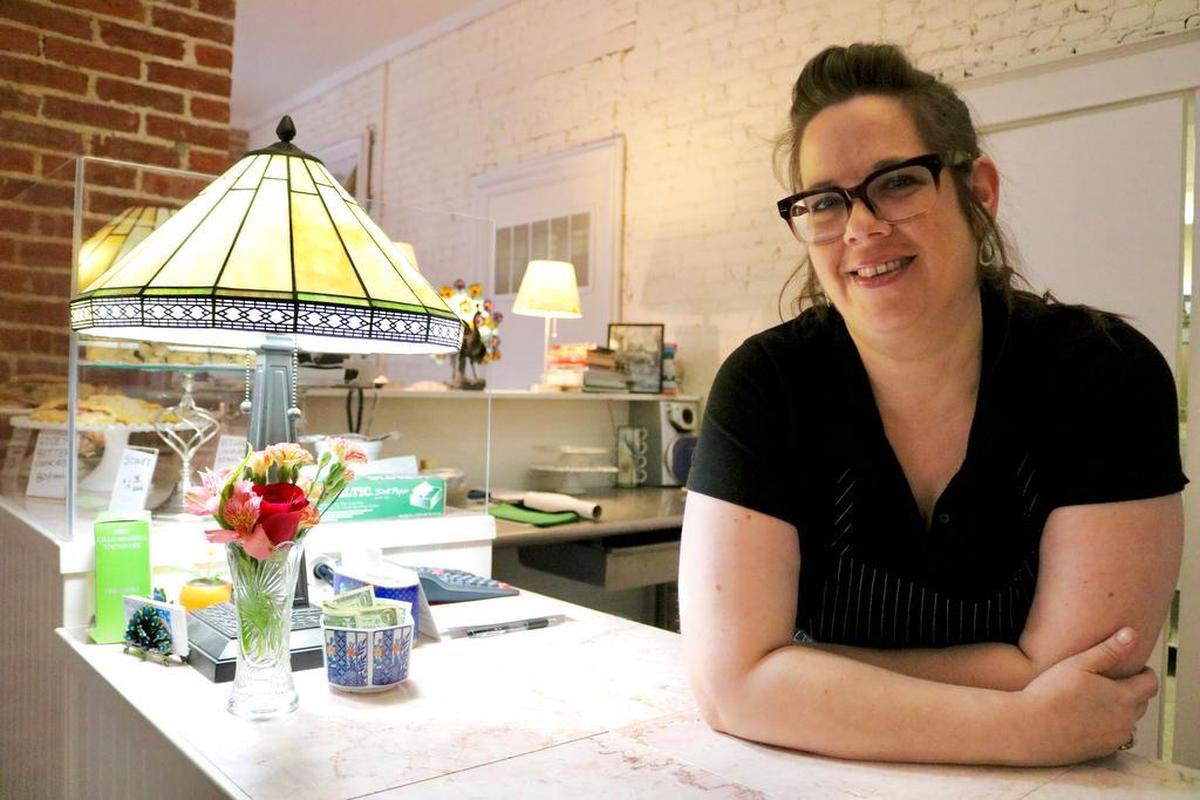 Peacock Bakery and Cafe General Manager Rebekah Finley leans on the bakery counter inside the business’s new location at 802 9th St. The business had its first day open in what used to be The House of Plenty on Nov. 17. The eatery now offers breakfast and lunch with a new simple menu.