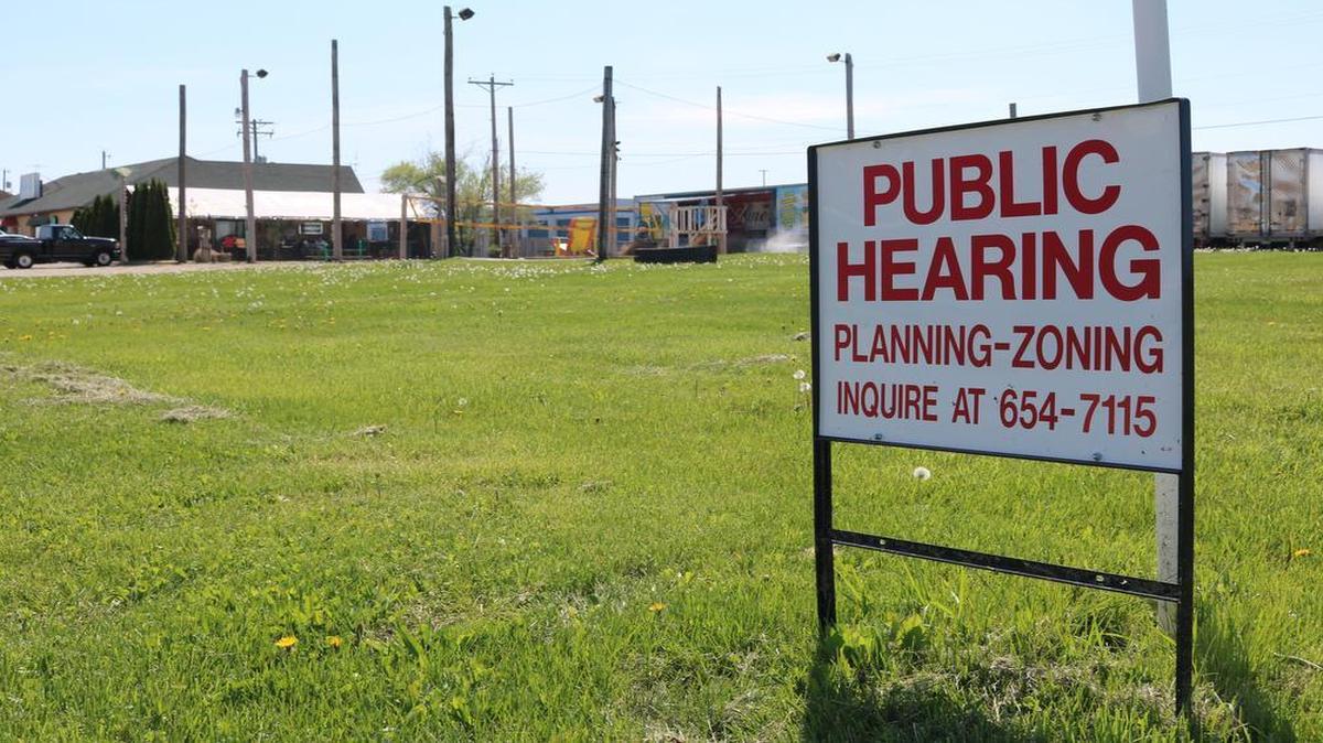 A public hearing sign stands in the lot that will house the new Relevant Pregnancy Care Center Facility. The lot is located on Plaza Drive, north of the volleyball courts at E.L. Flanagan’s. The lot was donated to the center by Pete and Jane Korte of Highland, owners of Korte & Luitjohan Contractors.