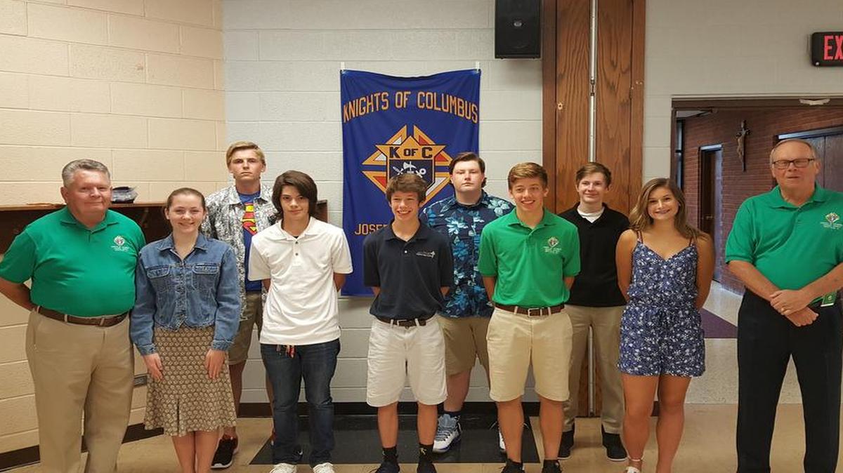 Knights of Columbus Scholarship Winners From left are Grand Knight Bill Ray, Teresa Barz, Jeddidiah Eggering, Taylor Cox, Jacob Jones, Ian Weir, Daniel Jones, Kellen Weir, Bridget Weeks, and John Sapolis, scholarship chairman.