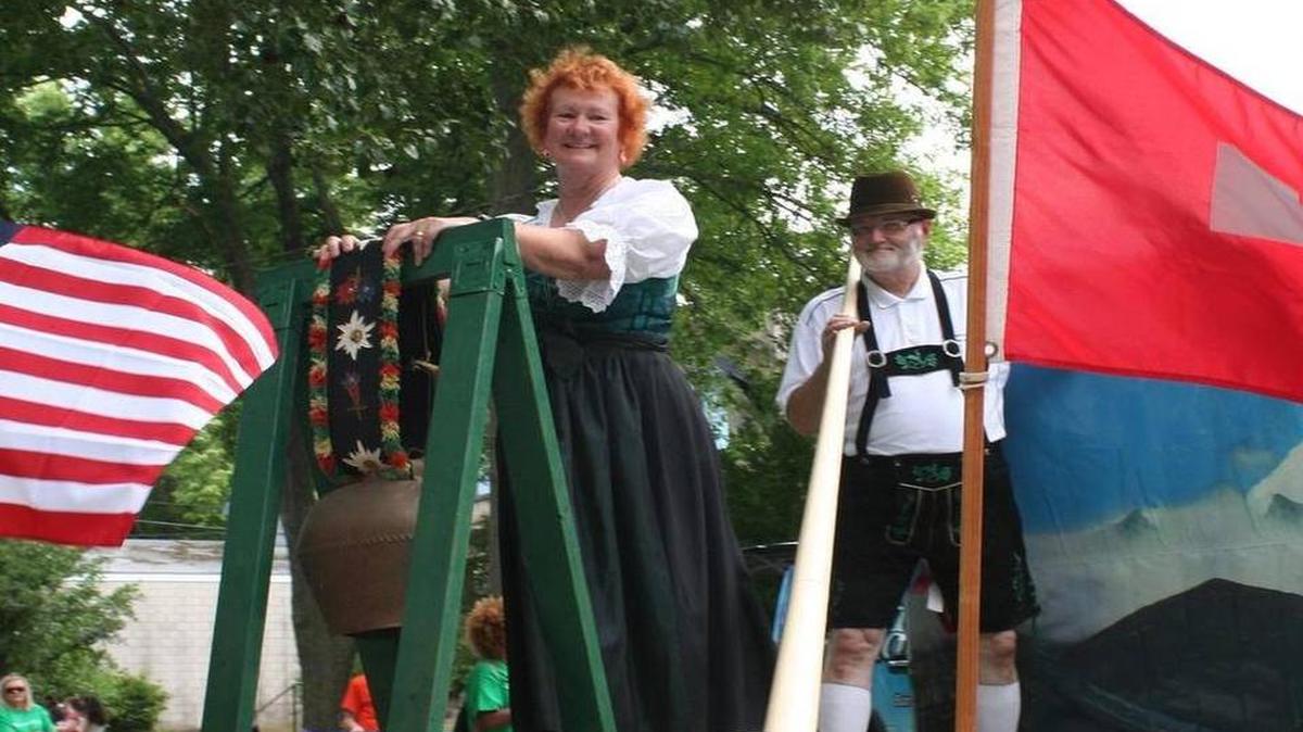 Maxine Johnson, secretary for Highland Historical Society and John Jonson, on the alp horn, membership chairman and newsletter chairman, ride get back to Highland’s Swiss roots on the society’s float in the Schweizerfest parade last year.