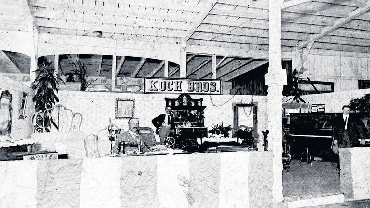 Feutz & Junod Furniture on north end and Ammann Brothers on south end, later becoming Koch Brothers Store at Broadway and Washington. Photo from Charles McKittrick