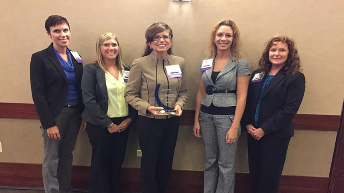 
HSHS St. Joseph’s Hospital in Highland was one of only five honorees to receive an Outstanding Quality Excellence Award from the Illinois Hospital Association (IHA) during the IHA Institute for Innovations in Care and Quality’s 2015 Quality Excellence Achievement Awards on Sept. 11. Accepting the award on behalf of HSHS St. Joseph’s Hospital, from left, were Beth Govero, chief nursing officer; Carrie Erlinger, director of quality, patient safety and risk management; Peggy Sebastian, president and CEO; Teresa Cornelius, director of inpatient services; Connie DeProw, nurse manager for case management/transition planning.

