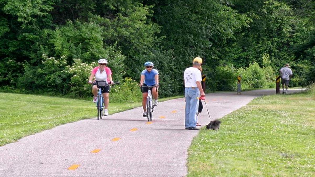 Riders enjoy the MCT Schoolhouse Trail, a 15.5 mile asphalt trail from Harrison Street in Madison to just east of Vaught Lane in Troy. This is one of many bike trails available for riders in Madison and St. Clair counties.