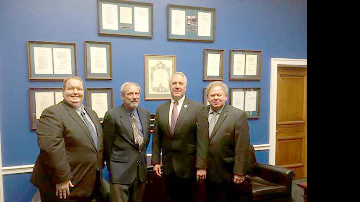 
Congressman John Shimkus (R, Illinois-15) met with three community pharmacists last week in Washington, D.C. Anthony Budde of Highland, Bruce Wood of Arthur and Garth Reynolds, both of Springfield came to Washington to discuss issues affecting community pharmacies. From left are Wood, Reynolds, Shimkus and Budde. 

