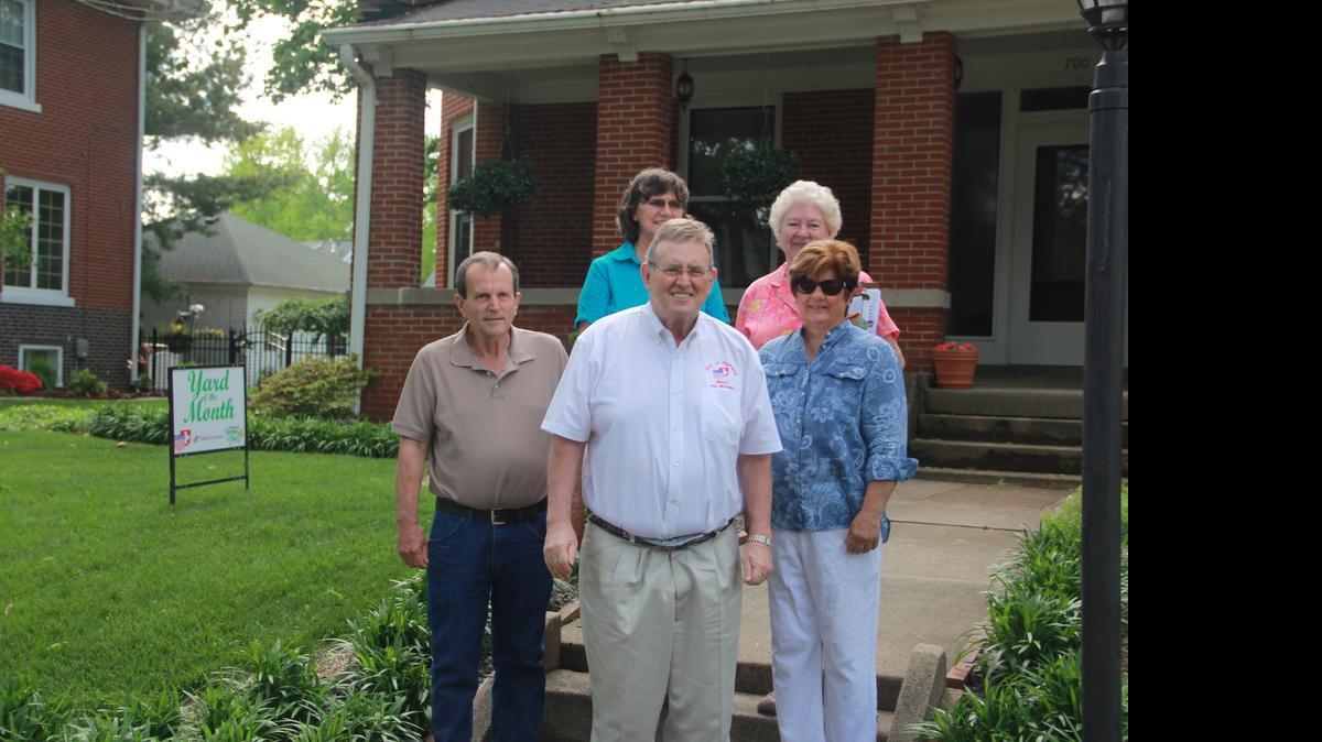 
Mike and Jeanine Pacatte pose for a picture with Mayor Joe Michaelis along with garden club members Judy West and Kathy Moore.
