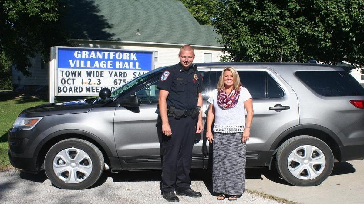 
Grantfork Police Chief Justin Rottmann and Kim Swisher, area specialist for USDA Rural Development in Mount Vernon, stand in front of Grantfork’s new police vehicle, a 2016 Ford Explorer.
