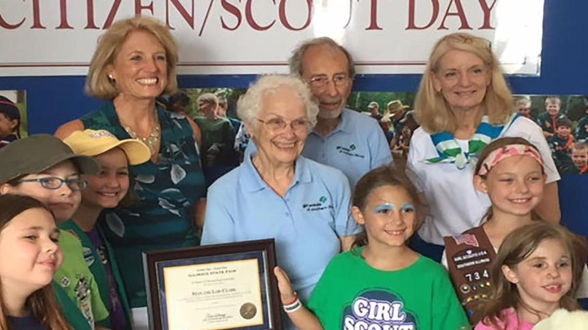 
Stan and Lois (light blue shirts center) are surrounded by Girl Scouts from the Trenton, Lebanon and New Baden area. At left is Leslie Geissler Munger, Illinois comptroller, and at right is Angie Zahn, Girl Scouts of Southern Illinois Board of Directors member. Stan and Lois were recognized by Comptroller Munger yesterday at the Illinois State Fair for their outstanding volunteerism to girls and community service. Aug. 17 was Senior Citizens Day and Girl Scout Day at the Illinois State Fair.
