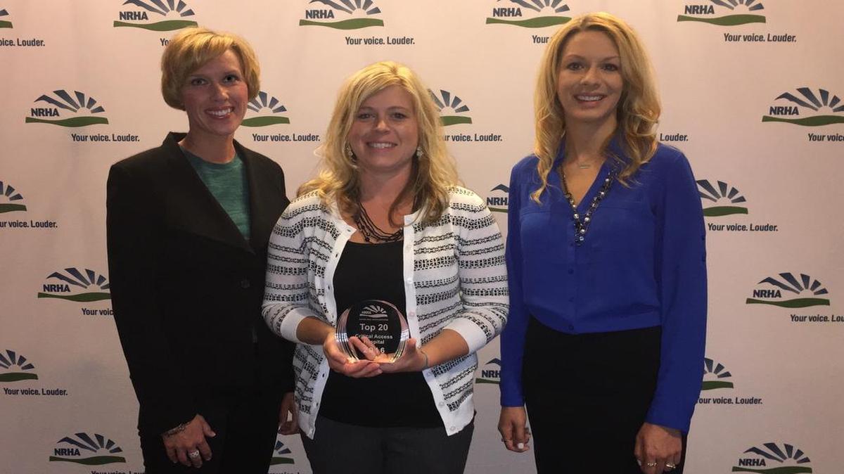 Elizabeth Govero, chief nursing officer at HSHS St. Joseph’s Hospital-Highland (left), is joined by Melissa Cates, interim director of quality (center) and Teresa Cornelius, director of clinical operations, to accept the National Rural Health Association’s Top 20 Critical Access Hospitals award in Kansas City.