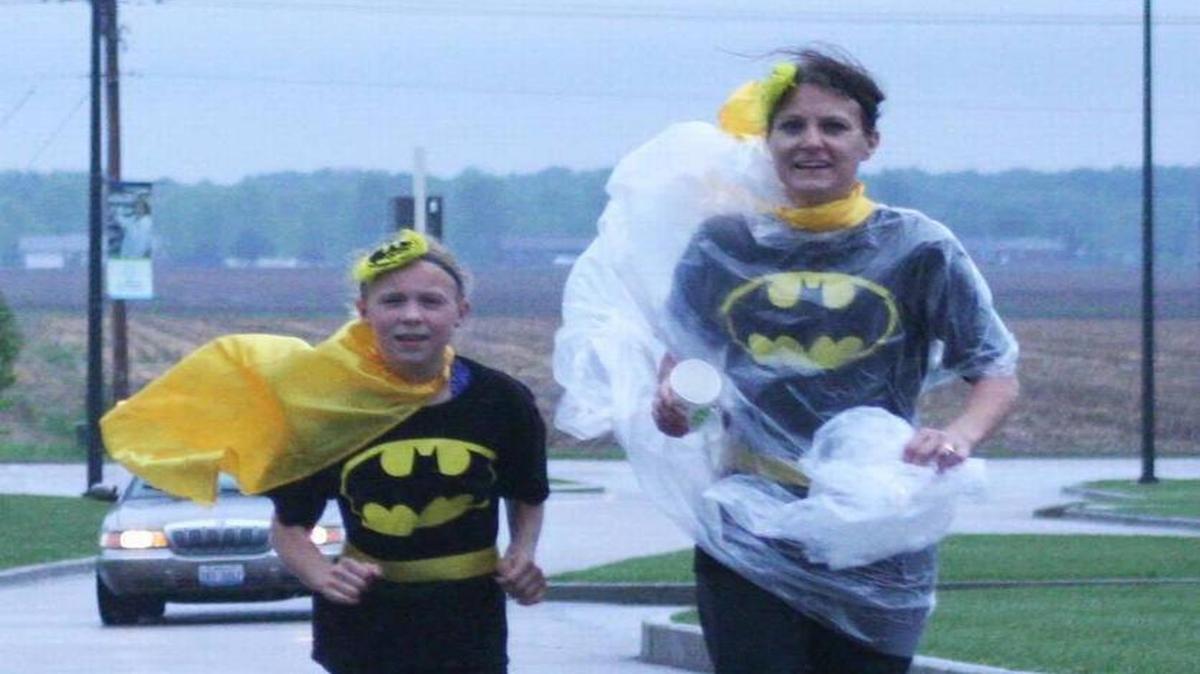 Addison (left) and Kari Crask participate in the Super Hero Run on Saturday at St. Joseph’s Hospital in Highland last year.