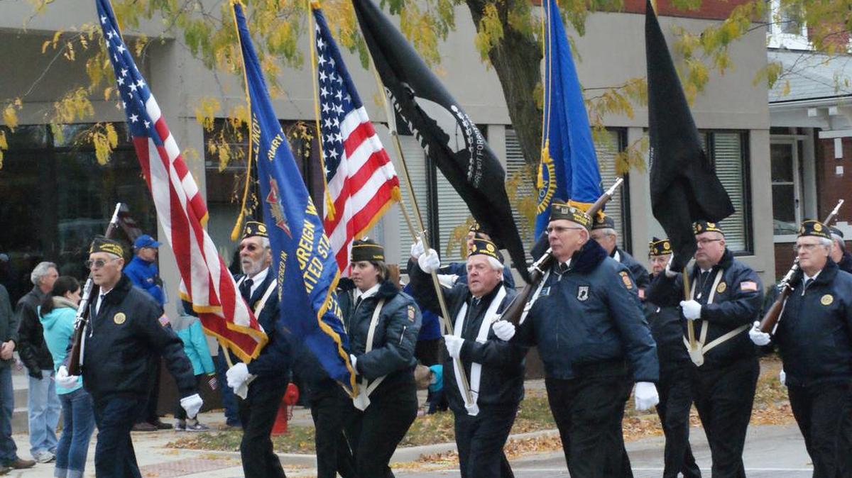 The Highland VFW and American Legion Color Guard march in the Veterans Day parade Sunday afternoon in Highland.