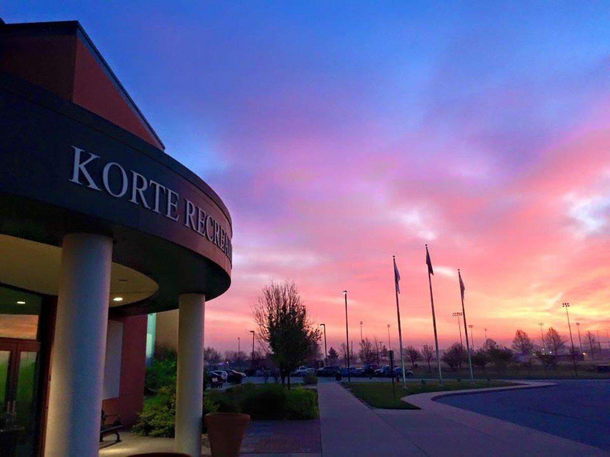 The setting sun is a backdrop for the entrance to Korte Recreation Center in Highland, former headquarters of Ralph Korte Construction Co. Its opening in 2001 was one of Ralph Korte’s proudest moments.