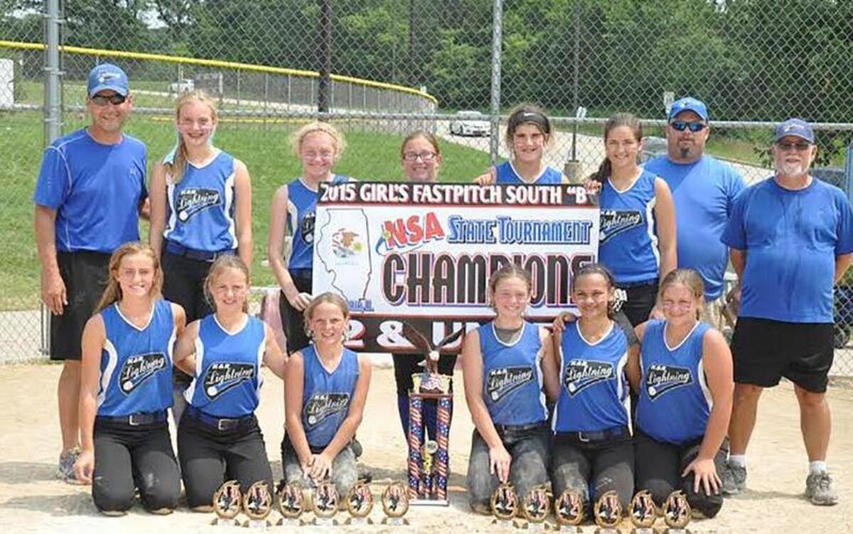 
The K and R Lightning is comprised of, front row from left to right, Madison Fenton, Alexis Lynch, Grace Saunders, Shelby Houchlei, Megan Kronk, Chloe Beck; back row, coach Chad Compton, Morgan Lidy, Madison Compton, Trista Koertge, Taylor Fleming, Emily Reynolds, coach Josh Houchlei and head coach Randy Brown.
