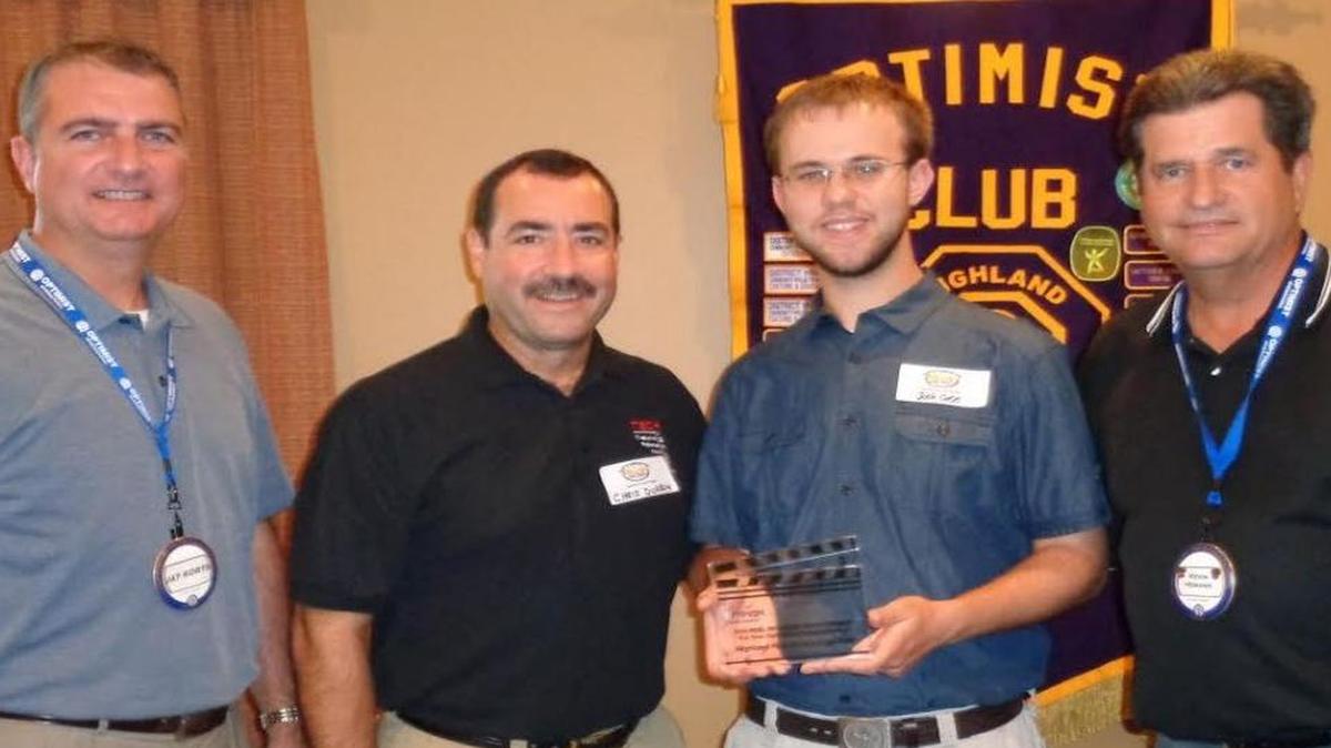 From left are Highland Optimist Club President Jay Korte, Chris Durbin, Josh Case, and Optimist Club Secretary and past president Kevin Hemann as the club awards Case with the Optimist International 2016 Reel of Optimism Video Contest.
