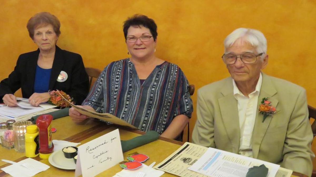 Cynthia O’Neill with her sister, Suzie Hollenkamp, and husband, Terry.