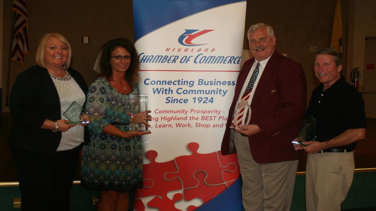 From left are Tricia Buehne, who received the Bill Pierce Chamber Member of the Year Award; Nancy Gramlich, who received the Homer Poss Lifetime Achievement Award; Wayne Steiner, who received the Bob Hardy Citizen of the Year Award; and Jim Gutzler, who received the Business Person of the Year award, as they pose for a photo.