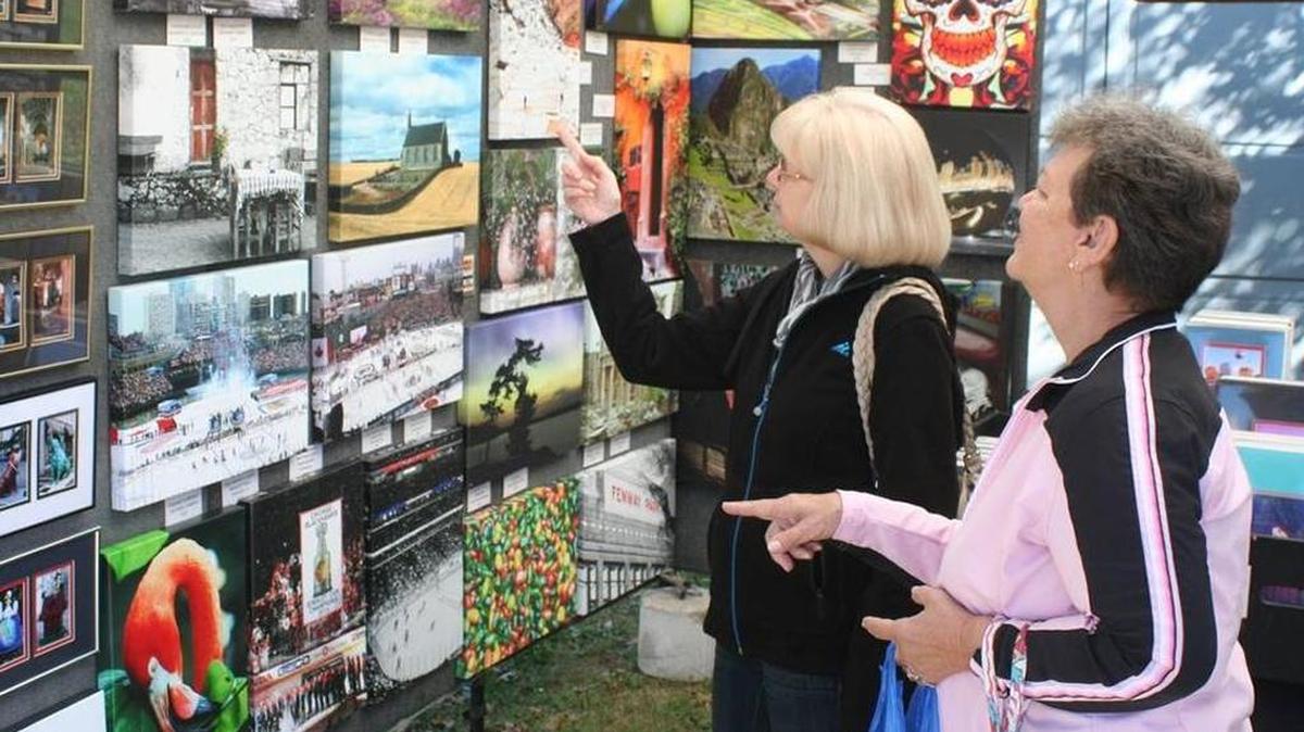Anne Brickey (left) and Linda Kemper (right), both of Nashville, attended Art in the Park for the first time last year, and were captivated by the various and creative artworks.