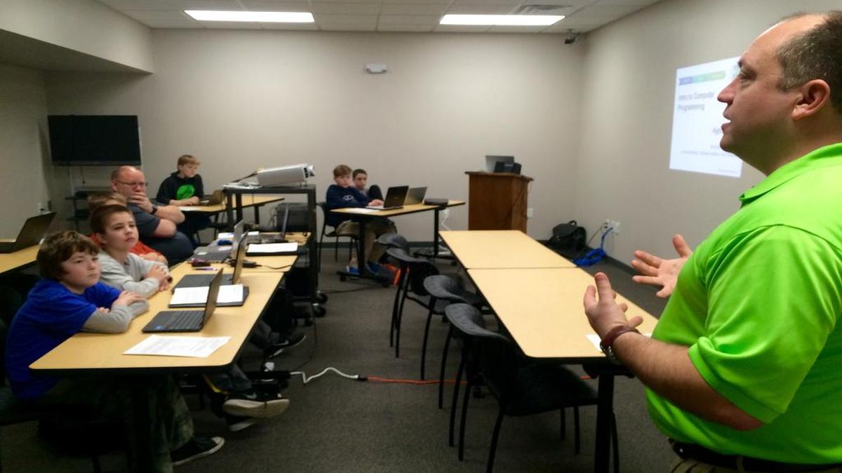 Pederson gives a short motivational speech to the new coding students, kicking off the first class of the “Intro to Coding” series. In his speech Pederson tells students that they have an ability to make a difference and make the world a better place through their understanding of technology.