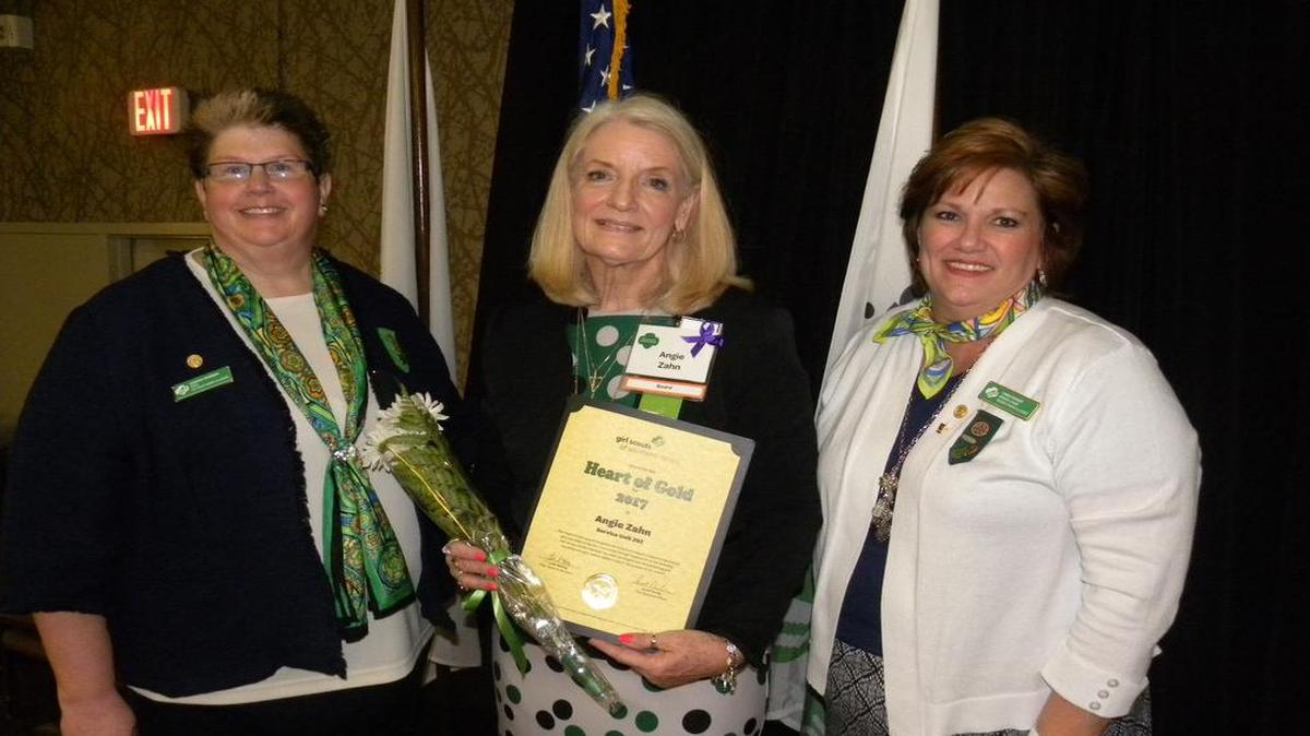 From left are Sarah Durbin, GSSI CEO; Angie Zahn, Heart of Gold recipient; and Linda Manley, GSSI Board of Directors chair person. The Heart of Gold Award recognizes the long-term impact a volunteer has had on girls and adults in her community through involvement in Girl Scouting. The service of this volunteer has been an integral part of maintaining and recruiting nedw girls and/or adults in one of more areas of GSSI. Zahn is from Service Unit 202 in Clinton/St. Clair counties.