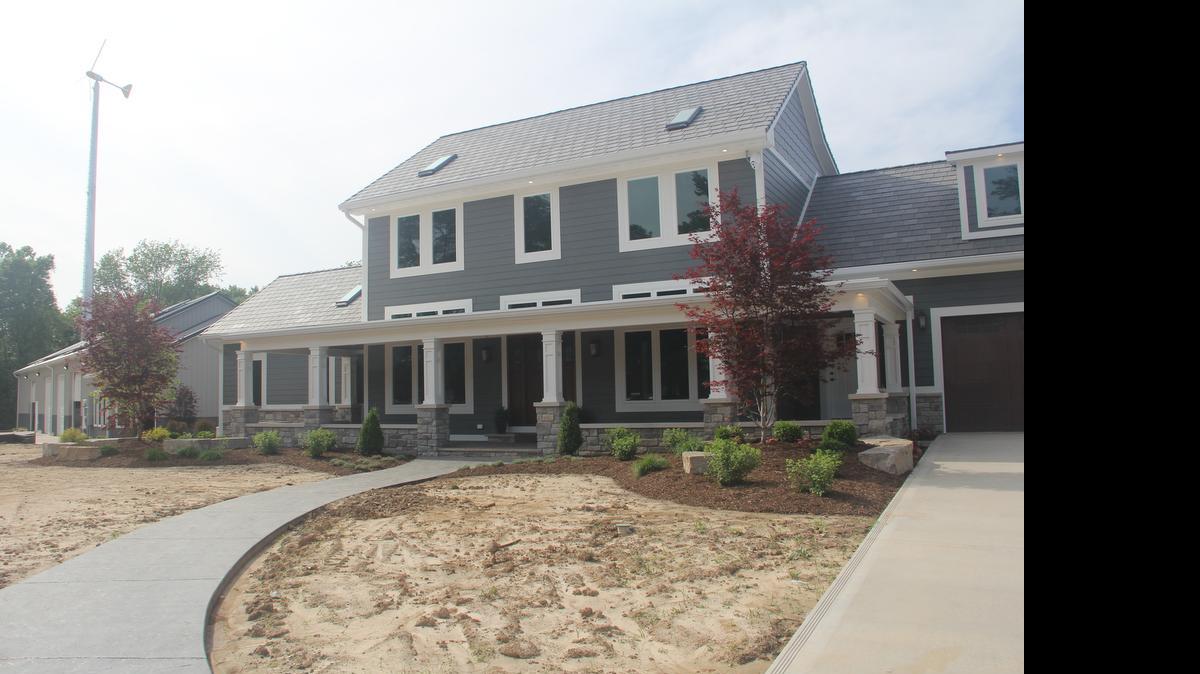 
Oasis Construction and Roof President Nathan Verning and his wife and their two children moved into their new home this week at 8729 Lower Marine Road in St. Jacob. Among the house’s amenities are 66 solar panels and a wind turbine.
