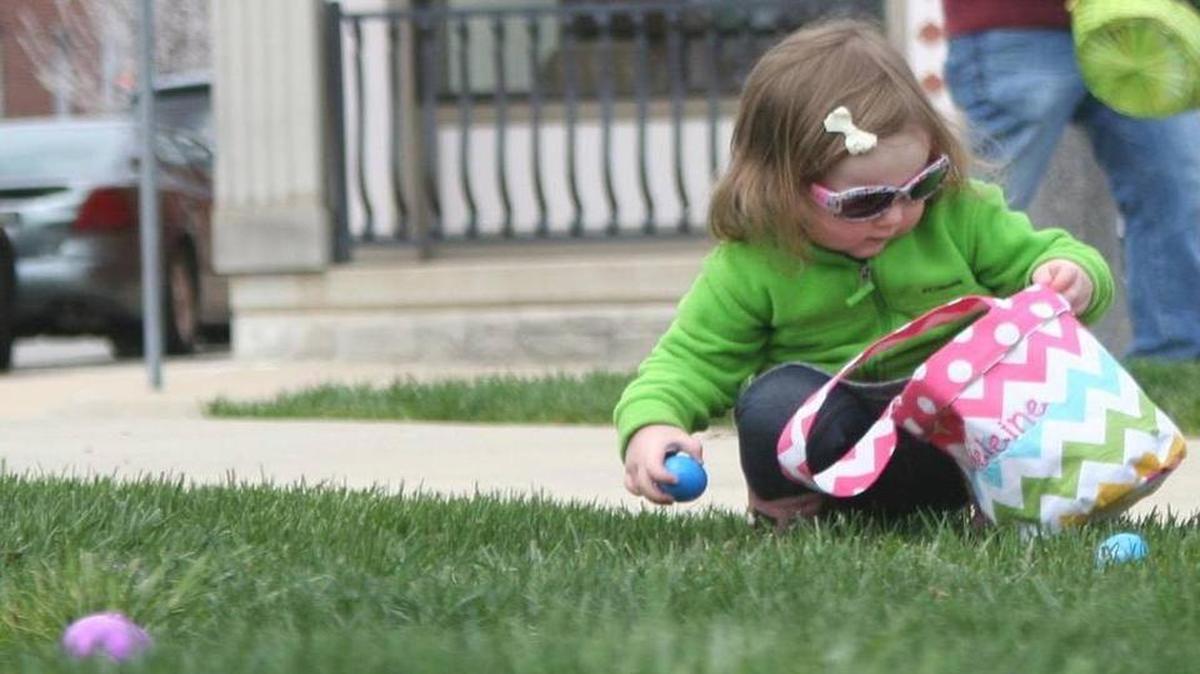 Madeleine Gourley coolly collects eggs at the Highland News Leader Easter Egg Hunt last year on the Highland Square.