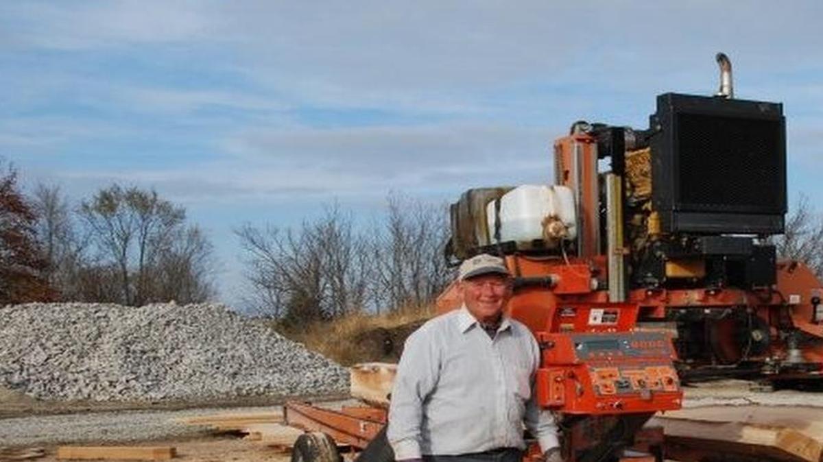 J.R. Potthast of Thick and Thin Lumber Mill in Pierron with his portable mill.