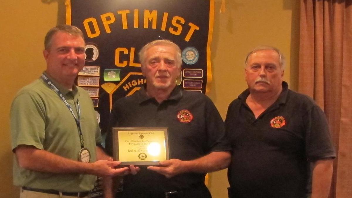 Highland Firefighter of the Year: From left are Highland Optimist Club president Jay Korte, Highland Firefighter of the Year John Driemeyer, and Highland Fire Chief Rick Bloemker.