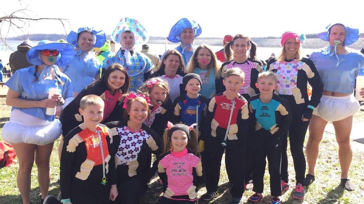 Highland FOP and Friends had the best team costume and Highland Police Department Sgt. Aric Steinbeck, far right, was honored with the best individual costume at the 2017 Law Enforcement Torch Run Polar Plunge and 5K Donut Dash benefiting Special Olympics Illinois Southwestern Area 12 on Saturday, Feb. 25 at the Carlyle Lake