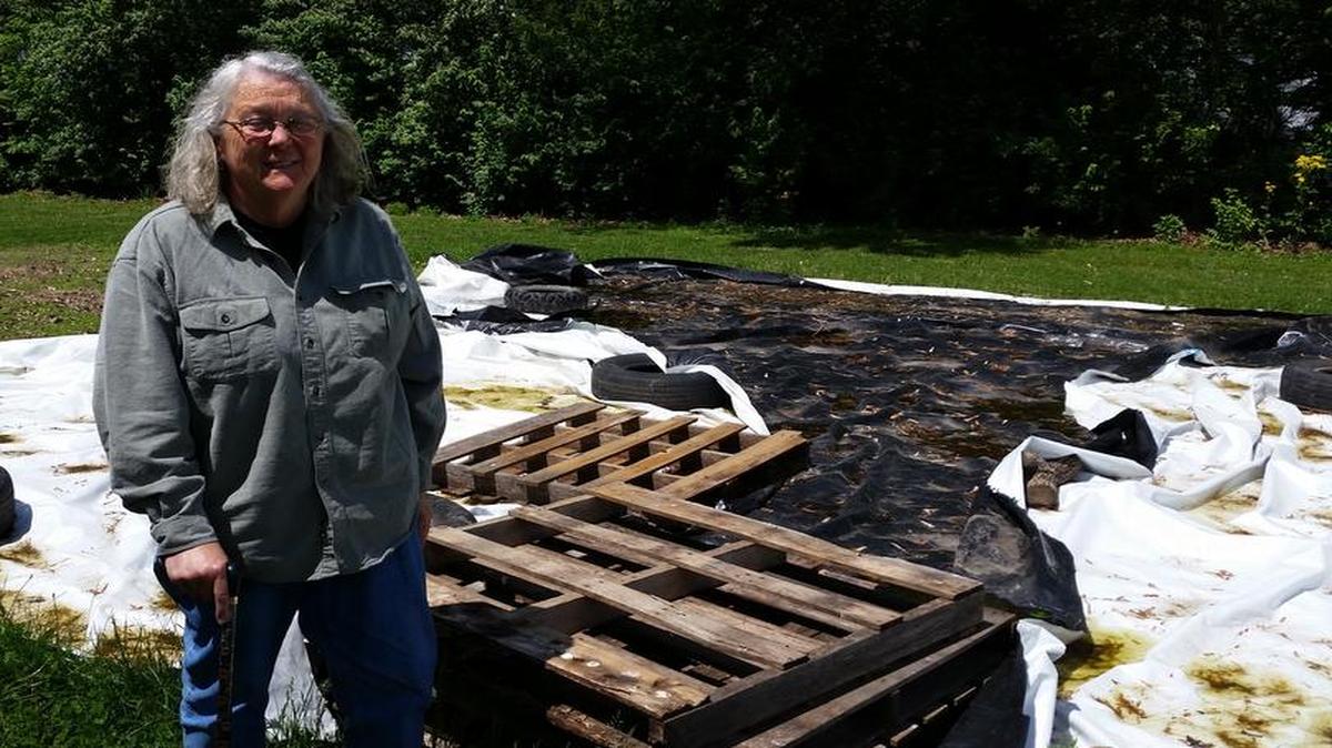 Peggy Dunn stands near what will become the new garden in New Douglas. The goal of the garden is to provide fresh produce to local families. There will be a ribbon cutting ceremony at New Douglas Elementary School on May 26 at 3:30 p.m.