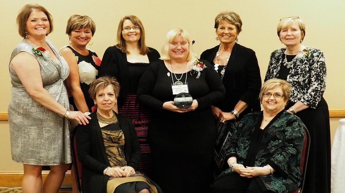 Outstanding Working Women Award Pictured with Dr. Pamella Gronemeyer (center) after she received the Outstanding Working Women Award are members of the Highland club, who attended the IFBW State Convention and were present for the award presentation. Seated, from left, Brenda Okai and Margaret Bennett. Standing in back, from left, are Susie Dewaele, Lisa Sauer, Suzette Schniers, Paula Redman, and Kathy Clark-Eller. Also attending the convention, but not present for the photo, was Michelle Hagen.