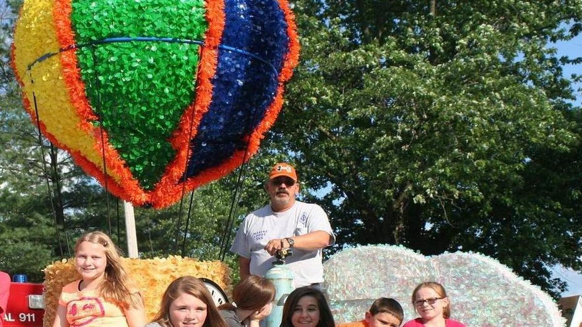 
From left, Cassidy Gergen, Sydney Noeltner, Hailey Hood, Jade Bowen, Robbie Meyer, Rylie Bloemker ride on a float in the Marine Homecoming Parade in June promoting Marine’s Hot Air Balloon and Sport Aviation Exhibition, which is set for this weekend. In back is Brian Meyer.
