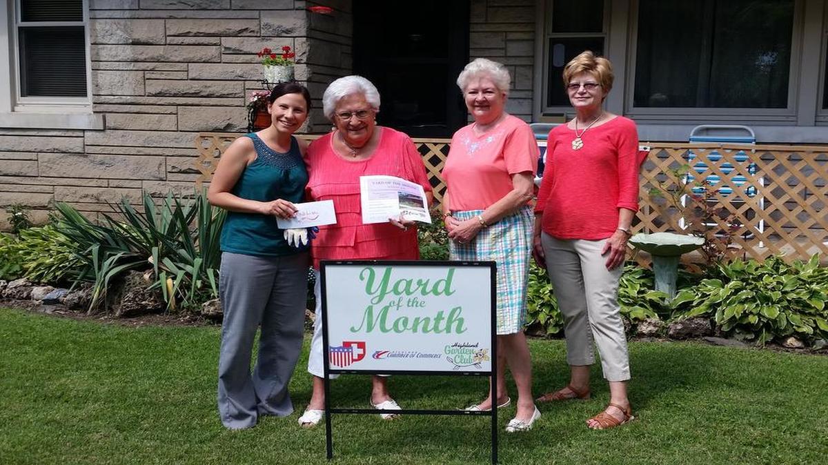 Pictured left are Highland COC Executive Director Nancie Zobrist, August Yard of the Month winner Anne Hundsdorfer, and Judy West and Carol Wieduwilt of the Highland Garden Club as they stand outside Hundsdorfer’s home located on Laurel Street.