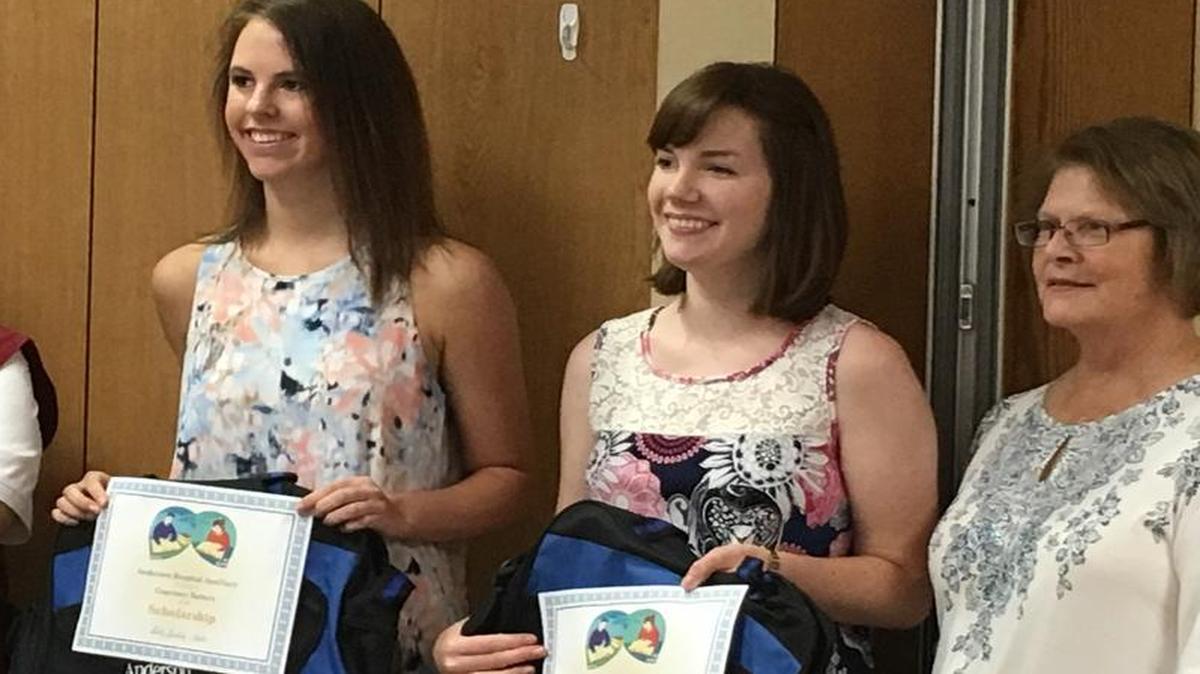 Pictured left to right are Anderson Hospital Auxiliary president Richard Trolliet, Courtney Deiters, Emily Duncan and Betty Ludwig, Auxiliary Scholarship chair.