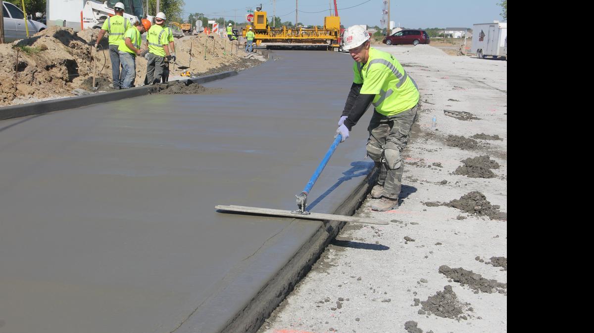 
Work is about to wrap up on the northeast peripheral route in Highland. On Friday, Justin Odle of Keller Construction finishes the concrete. Keller Construction expects to pour the final lane of the project early next week.
