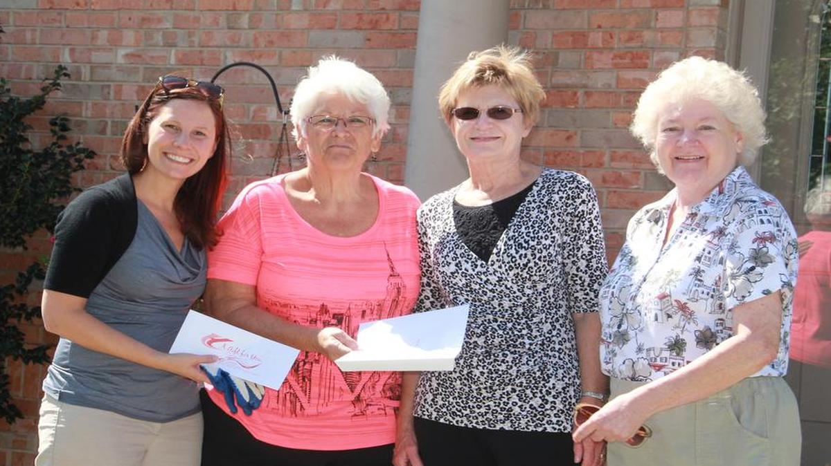 
Jane Bircher of 50A Auburn Court had the Highland Yard of the Month for September. Pictured with Bircher (second from left) are Chamber of Commerce Executive Director Nancie Zobrist, and Highland Garden Club members Carol Wieduwilt and Judy West.
