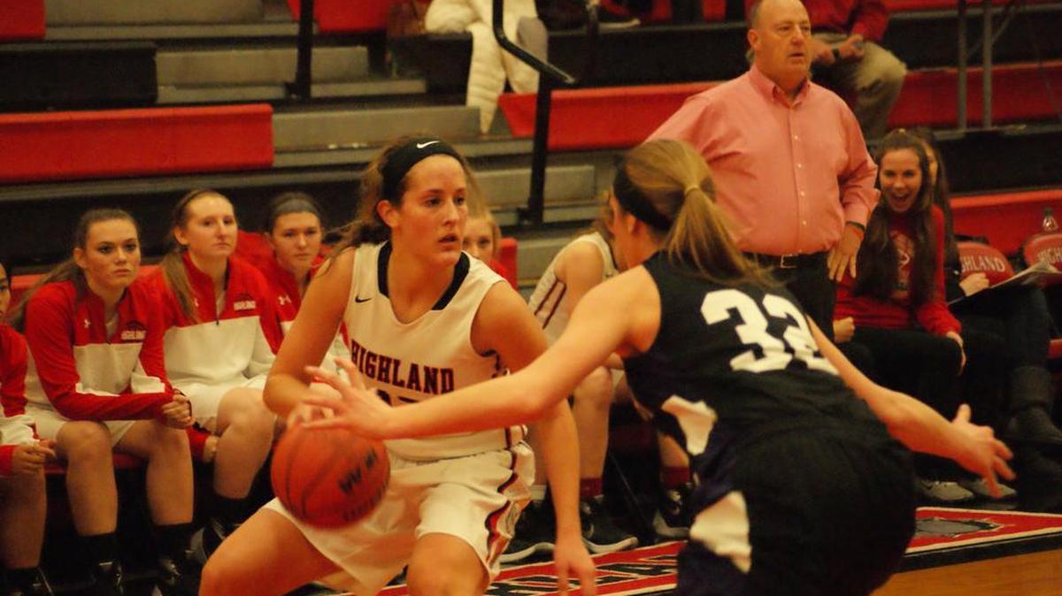Highland junior Alex LaPorta looks to make her move on Mascoutah senior Katie Jokish during the Lady Bulldogs’ 51-45 victory over the Indians Thursday night at HHS.