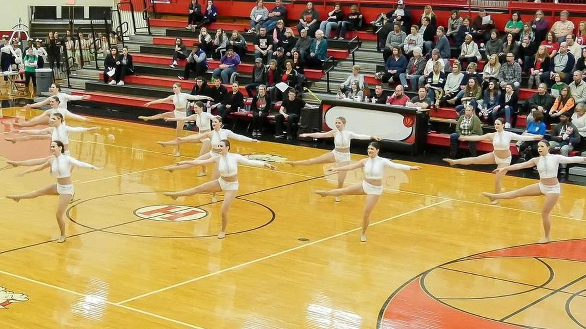 The members of the Highland High School varsity dance team perform their AA Lyrical routine which won first place Saturday at the Highland IDTA Regional Competition.