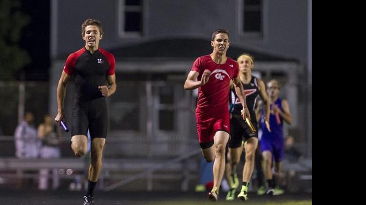 
Highland junior Brode Portell, left, and Chatham Glenwood’s Dominick Giovannelli battle it out in the final stretch of the 4 x 800-meter relay race, with Portell holding him off to win the event with a winning team time of 3:24.08 to edge out Chatham’s time of 3:25.17 during the Class 2A Springfield Lanphier Sectional last Friday at Memorial Stadium.
