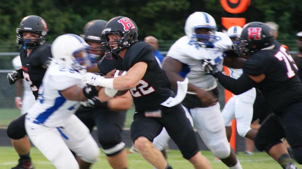 
Highland senior running back Andrew Winning plows for yardage in the first half of the Bulldogs’ 45-8 demolition of visiting Cahokia Friday night at HHS. Winning finished the game with 231 yards rushing and five touchdowns on 23 carries.
