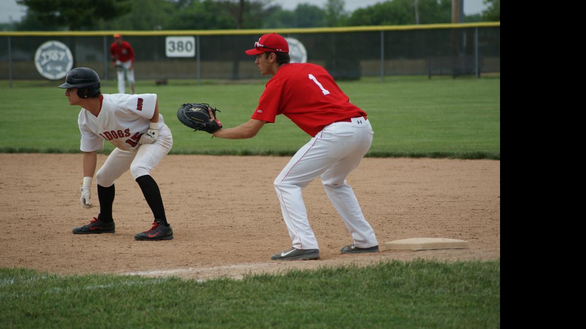 
Highland senior Cody Bentlage leads off first base late in a 4-3 loss to Chatham Glenwood Friday at Glik Park.

