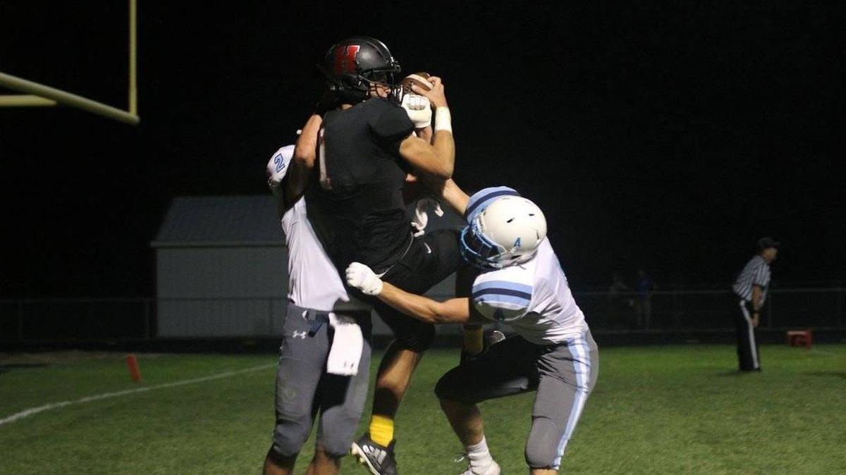 In this BND file photo from Sept. 1, 2017, Highland wide receiver Sam LaPorta makes a spectacular catch against Belleville East. LaPorta, now a senior, is getting looks from college football programs in the Ivy League and MAC.