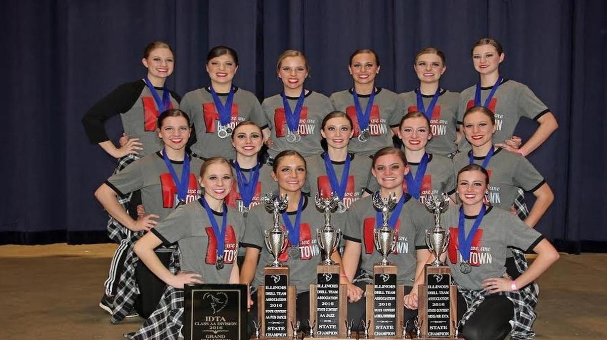 The HHS dance team poses with the hardware it earned Saturday at the IDTA State Finals in Springfield. The team consists of, first two from left to right, Leslie Drueke, Kelsey Lane, McKenzie Rosen, Lexy Hagler; second row, Reagan Thornton, Raven Miranda, Ally Becker, Abigail Rogier, Hannah Luitjohan; third row, Brooke Wilson, Kayla Davis, Claire Pabst, Katie Etter, Paige Foster and Olivia Genteman.