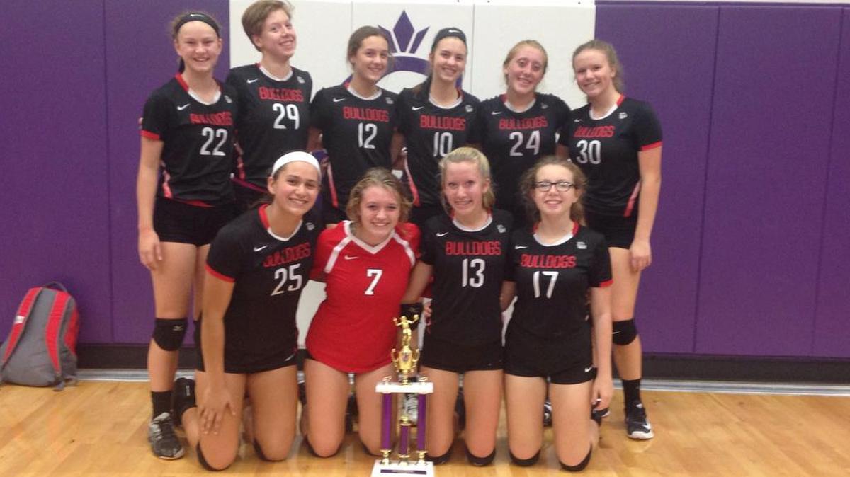 The HHS freshmen volleyball team shows off its championship trophy after winning the Collinsville Tournament on Saturday, Oct. 14. The freshmen Lady Bulldogs, who capped off a perfect 23-0 season, consisted of, front row from left, Taylor Kesner, Chloe Marti, Olivia Wilke, Angela Crews; back row, Kirsten Taylor, Anne Marie Beckemeyer, Delanie Wutzler, Lexi Korte, Delaina Sigman and Audrey Habing.