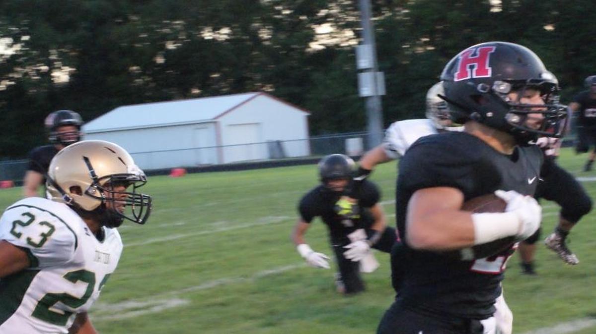 
Highland senior running back Andrew Winning, shown busting loose for a big gain against Mattoon last Friday night, has rushed for 519 yards on 49 carries (10.6 yards per rush), and has scored 13 touchdowns to lead the Bulldogs to a 3-0 record and the No. 10 ranking in the latest Associated Press Top 10 state football rankings.
