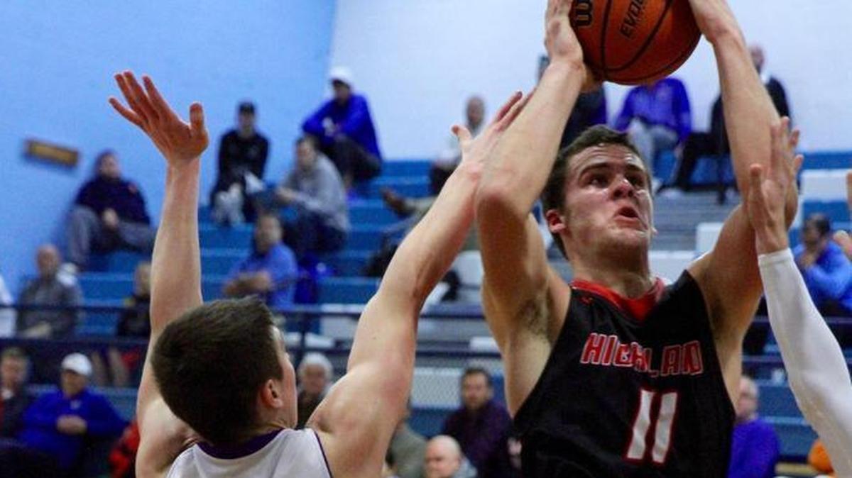 Highland junior Sam LaPorta goes up to score against Carlyle in the Bulldogs’ opening game of the Mater Dei Christmas Tournament on Wednesday, Dec. 27. LaPorta was named to the all-tournament first team.