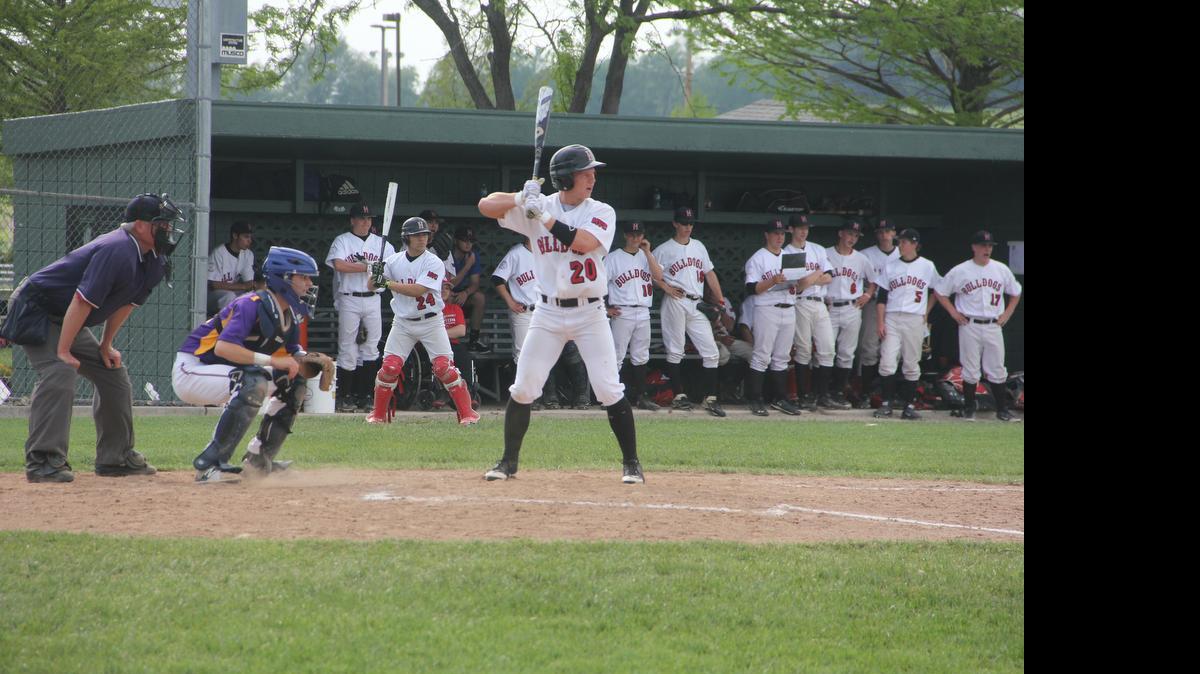 
Highland junior Andrew Winning is ready to face a pitch during the Bulldogs’ 5-2 loss to visiting Civic Memorial Monday at Glik Park.
