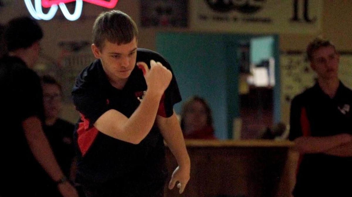 Highland junior Adam Buske bowled a team-high series of 633 to help the Bulldogs tie the host Triad Knights, 20-20, Tuesday, Dec. 12 at Camelot Bowl in Collinsville.