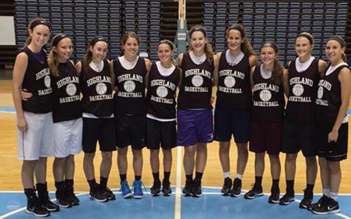 
The Highland High School girls basketball team is shown in the Dean Smith Center on the campus of the University of North Carolina in Chapel Hill, N.C. The Lady Bulldogs consist of, from left to right, Hayley Taylor, Alisse Koishor, Madison Wellen, Amanda Ponce, Rece Portell, Katie Kampwerth, Alex LaPorta, Breanna Frahm, Caitlin Lammers and Abby Melosi. Not pictured are head coach Mike Arbuthnot and assistant coaches Hartlieb and Terri Menke. 
